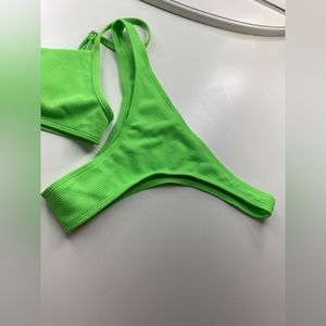 Matching lime green bikini set top size M bottoms size LARGE CHEEKY